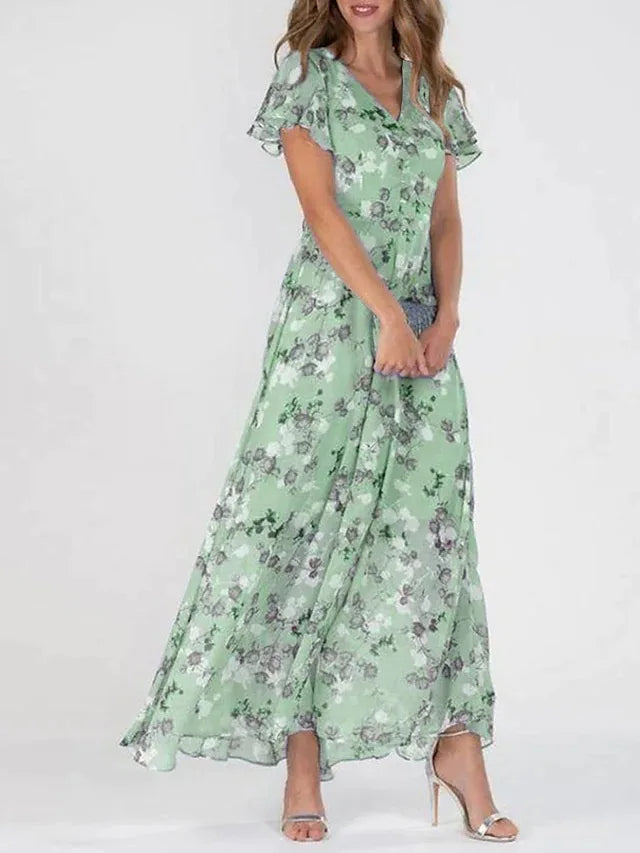 Lilia | Elegant blommig midiklänning