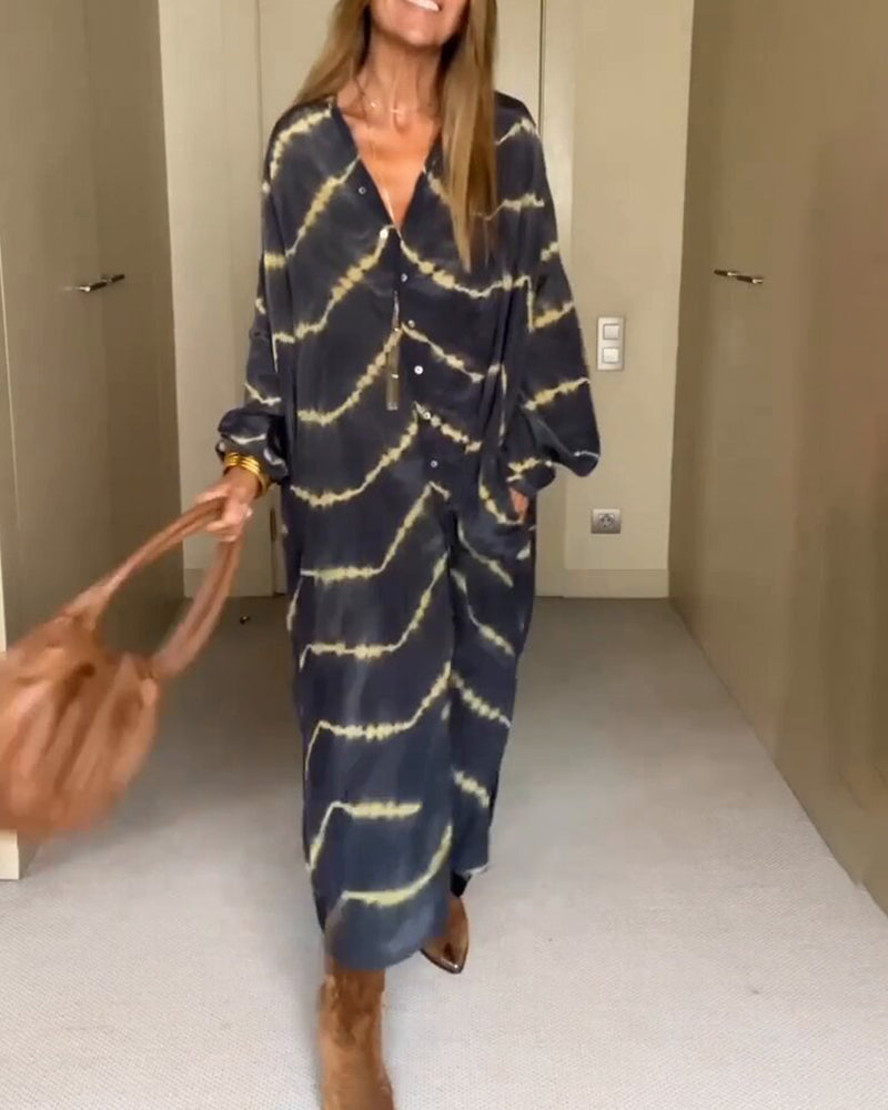 MAGGIE | Vid skuren maxiklänning med V-ringning