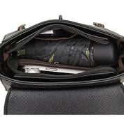 Lotte | Retro läderhandväska med spänne för damer