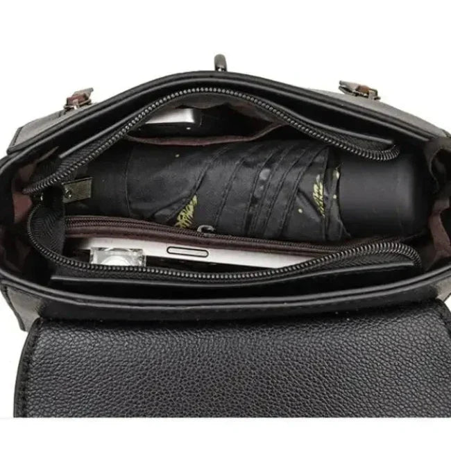 Lotte | Retro läderhandväska med spänne för damer