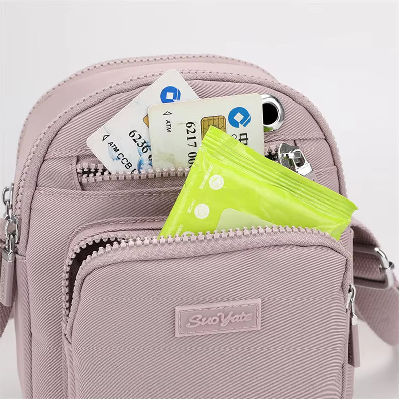 Zoe | Kompakt nylon crossbody-slingväska