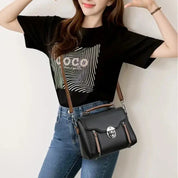 Lotte | Retro läderhandväska med spänne för damer