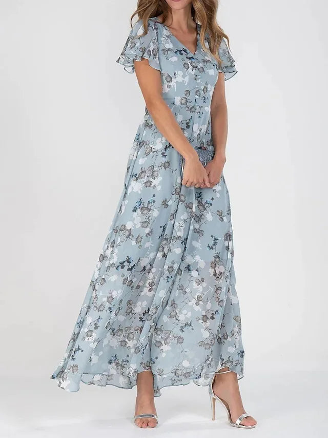 Lilia | Elegant blommig midiklänning