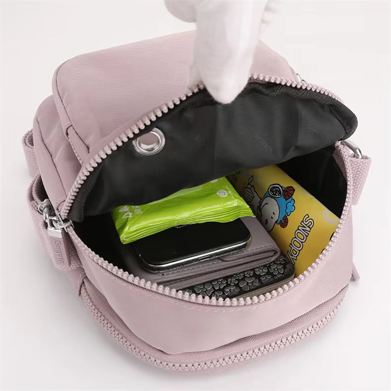 Zoe | Kompakt nylon crossbody-slingväska