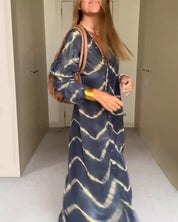 MAGGIE | Vid skuren maxiklänning med V-ringning