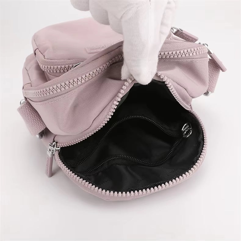Zoe | Kompakt nylon crossbody-slingväska
