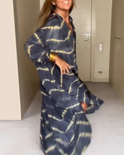 MAGGIE | Vid skuren maxiklänning med V-ringning