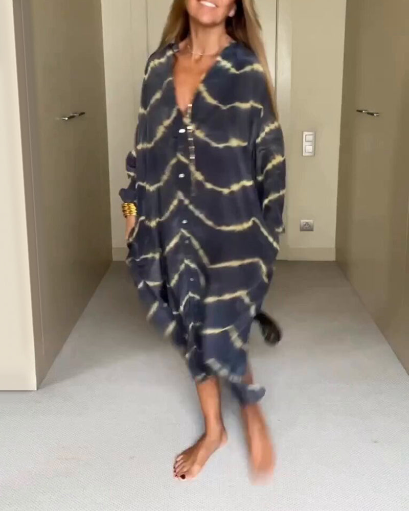 MAGGIE | Vid skuren maxiklänning med V-ringning