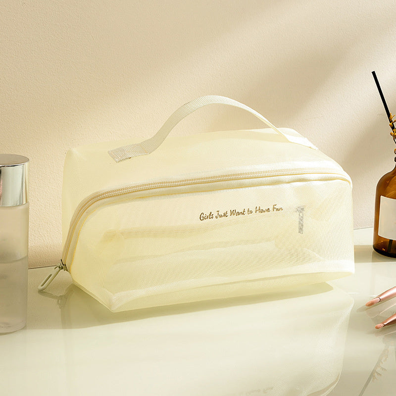 Mila | Rymlig rese-toalettväska i nätmaterial