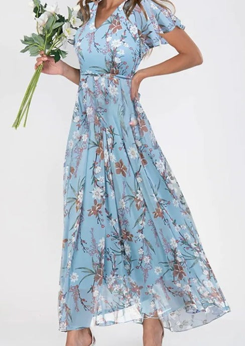 Lilia | Elegant blommig midiklänning