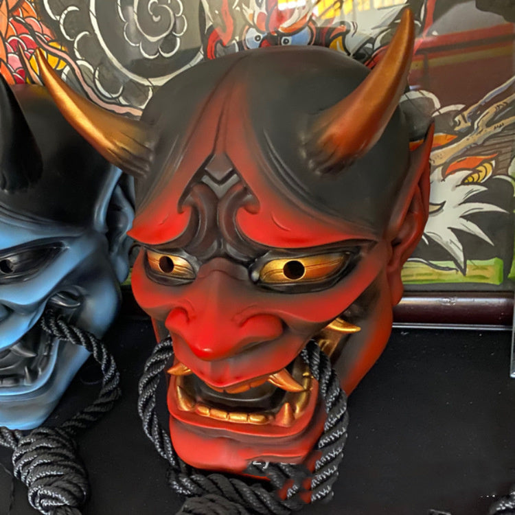 Japanische Dose, rotgesichtige Grimasse mit Seilhörnern 3