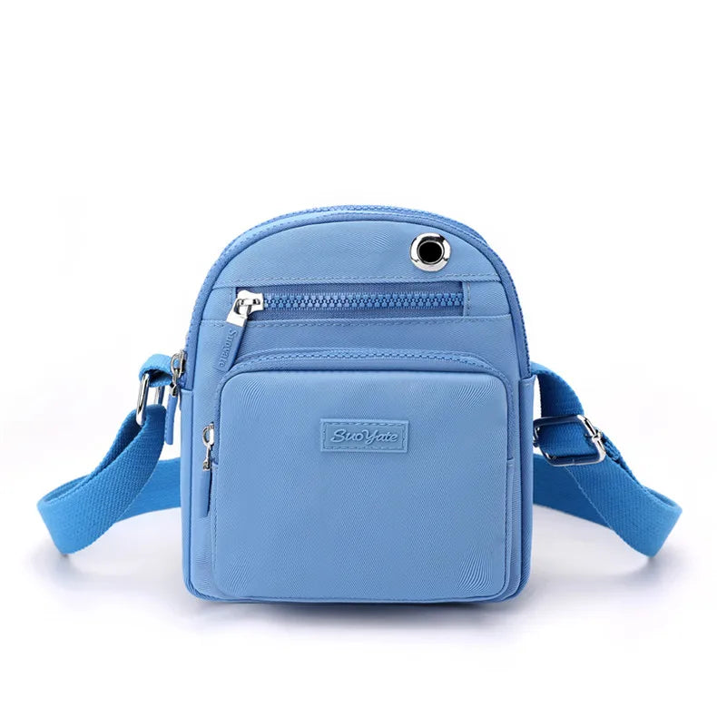 Zoe | Kompakt nylon crossbody-slingväska