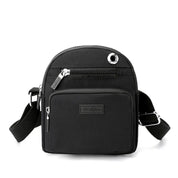Zoe | Kompakt nylon crossbody-slingväska