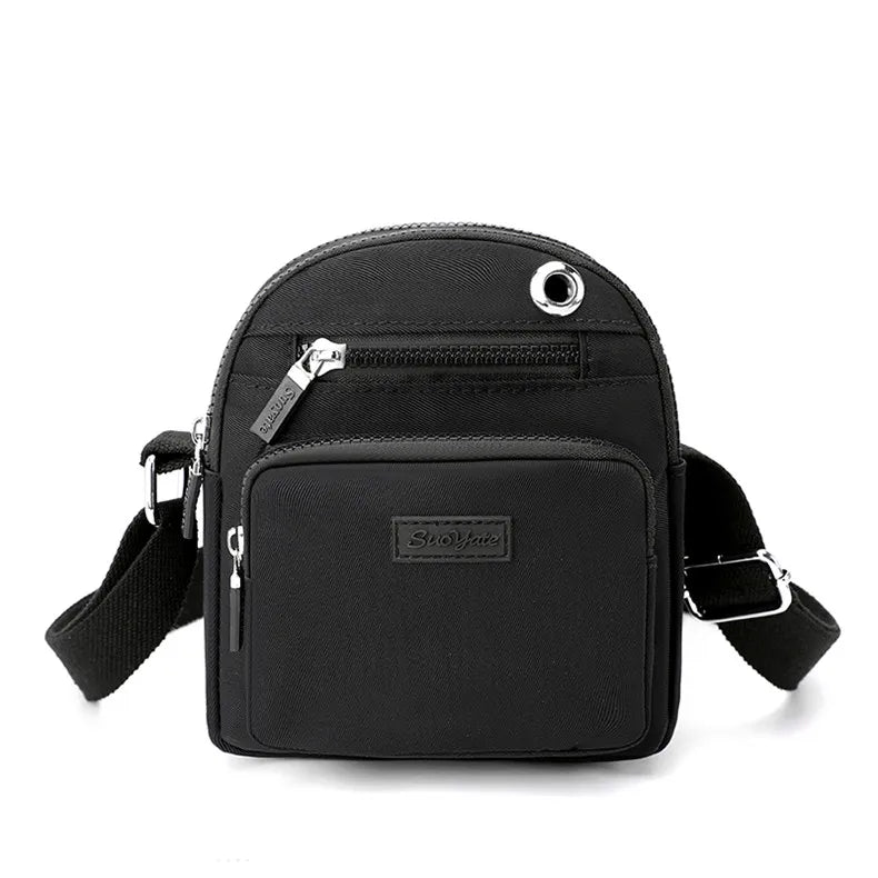Zoe | Kompakt nylon crossbody-slingväska