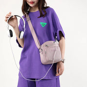 Zoe | Kompakt nylon crossbody-slingväska