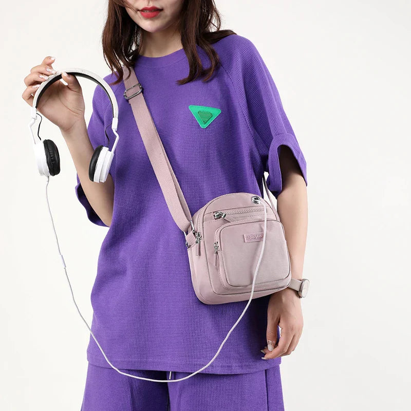 Zoe | Kompakt nylon crossbody-slingväska