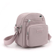 Zoe | Kompakt nylon crossbody-slingväska