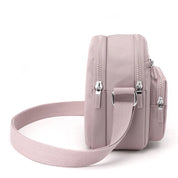 Zoe | Kompakt nylon crossbody-slingväska