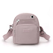 Zoe | Kompakt nylon crossbody-slingväska