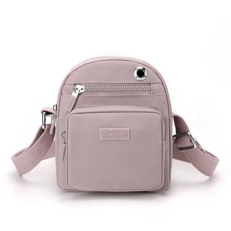 Zoe | Kompakt nylon crossbody-slingväska