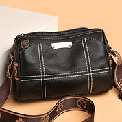 Sophie | Kompakt trippel-zip crossbodyväska