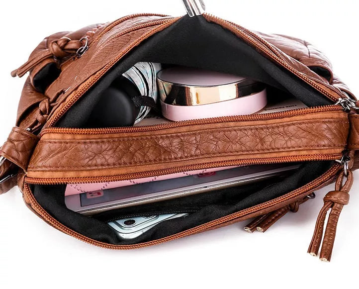 Elegante Damenhandtasche aus funktionalem, weichem Material 1