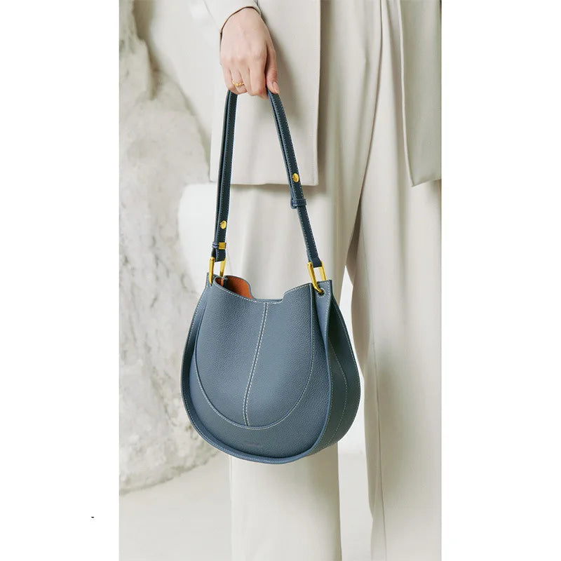 Elegante, runde Damen-Schultertasche aus Leder 0