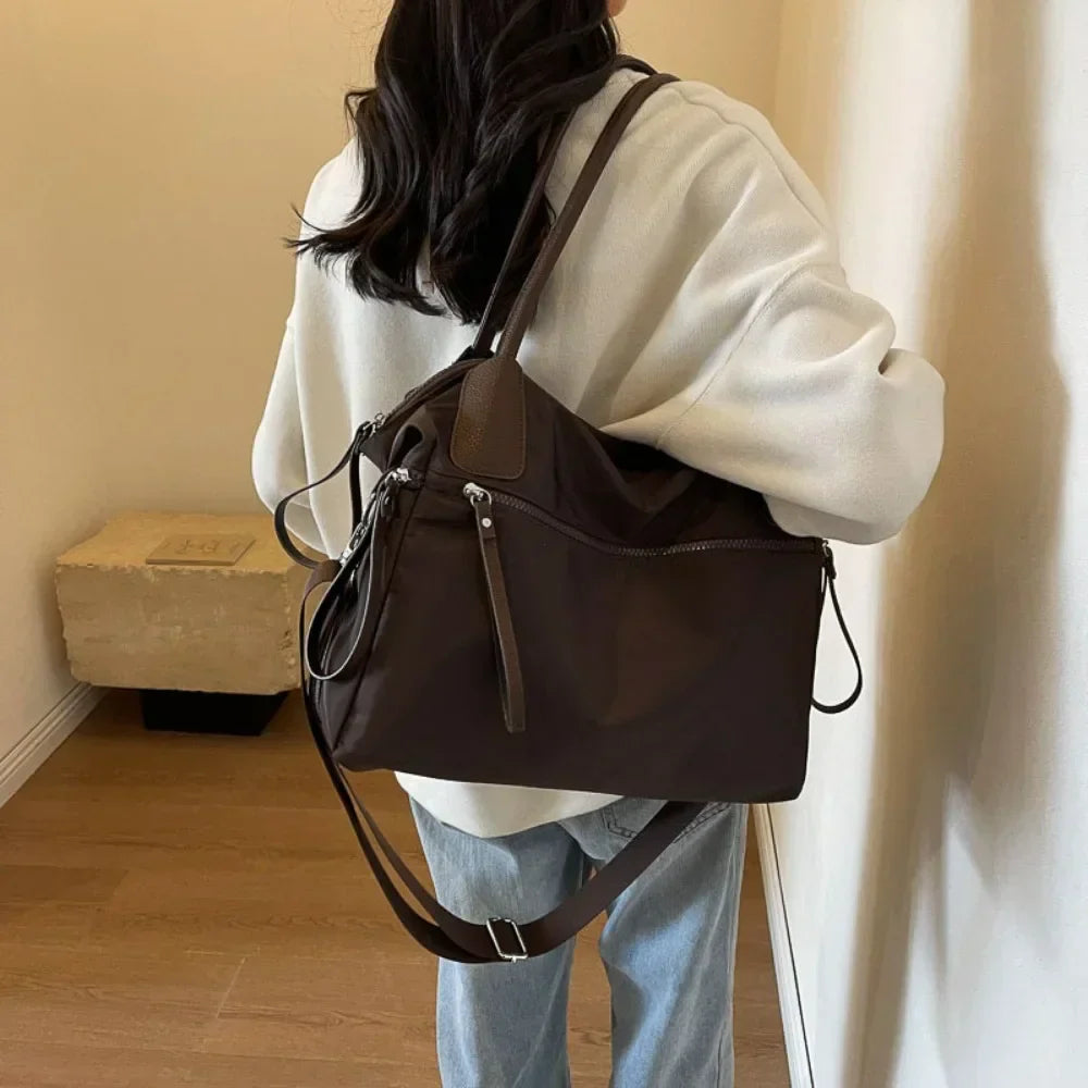 Lily | Stor kapacitet rese-crossbodyväska