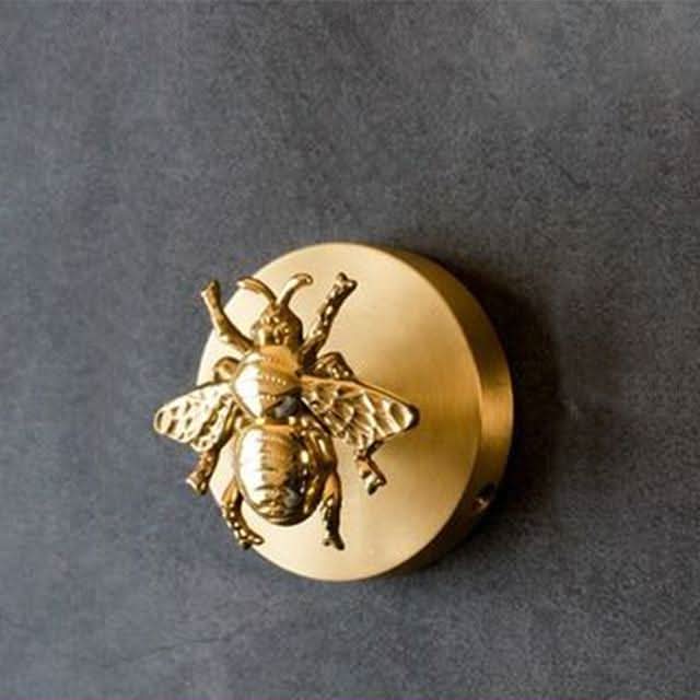 Wandhakenleiste aus Messing mit Tiermotiven und goldenen Akzenten 4